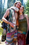 Lovely Rainbow couple keeping the '70s spirit alive with free flowing skirt and pants with a Genesha elephant scarf for accent.